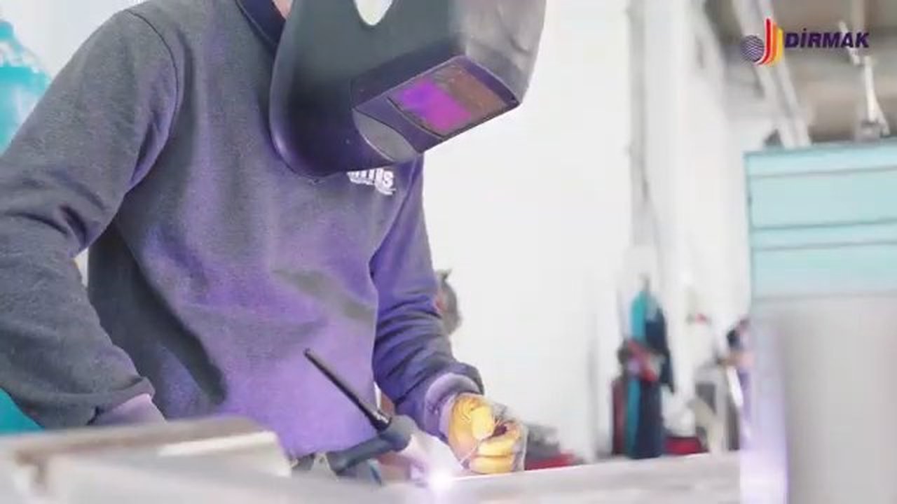 Welder at the Dirmak Makina factory finishing a stainless-steel sub-assembly for an industrial planetary mixer